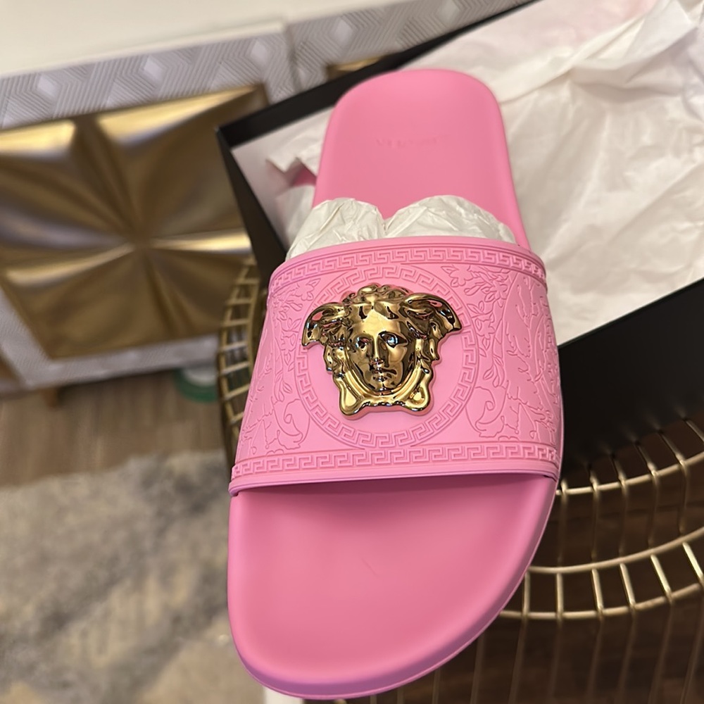 Authentic Versace (Palazzo Slides) New never worn still in original box.